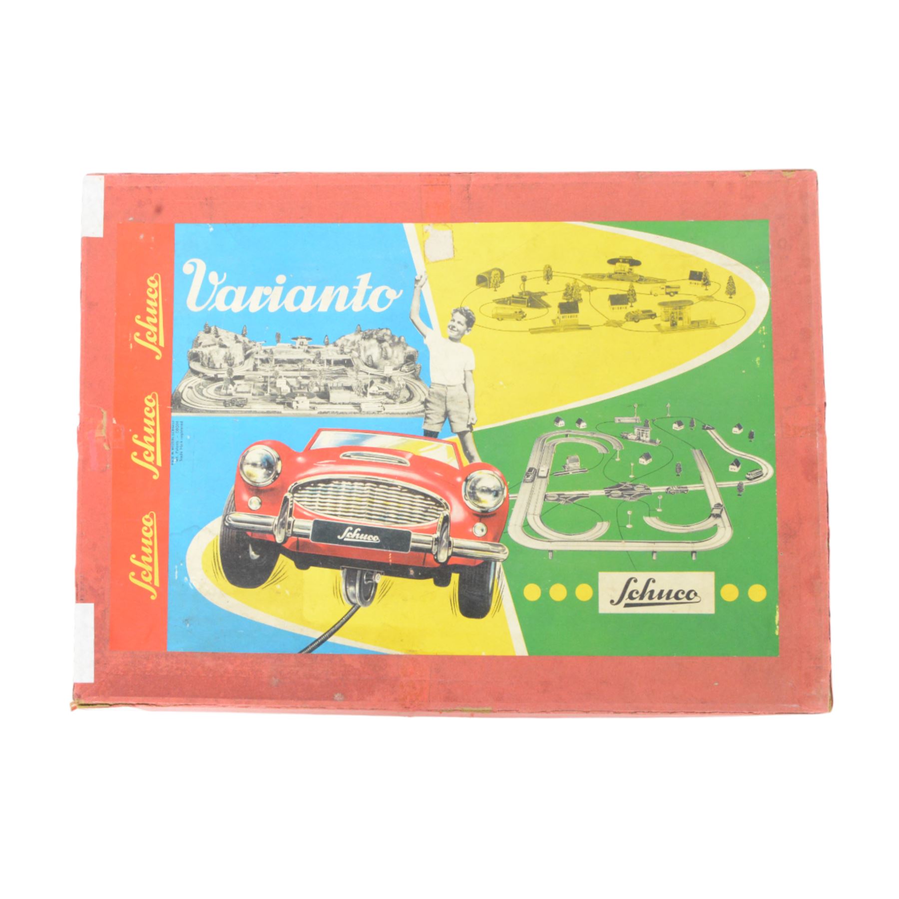 Schuco Varianto 3010 F boxed set, comprising two tinplate vehicles 3044 Varianto-Bus and 3041 Varianto-Limo, road sections, guidewires and signs, boxed