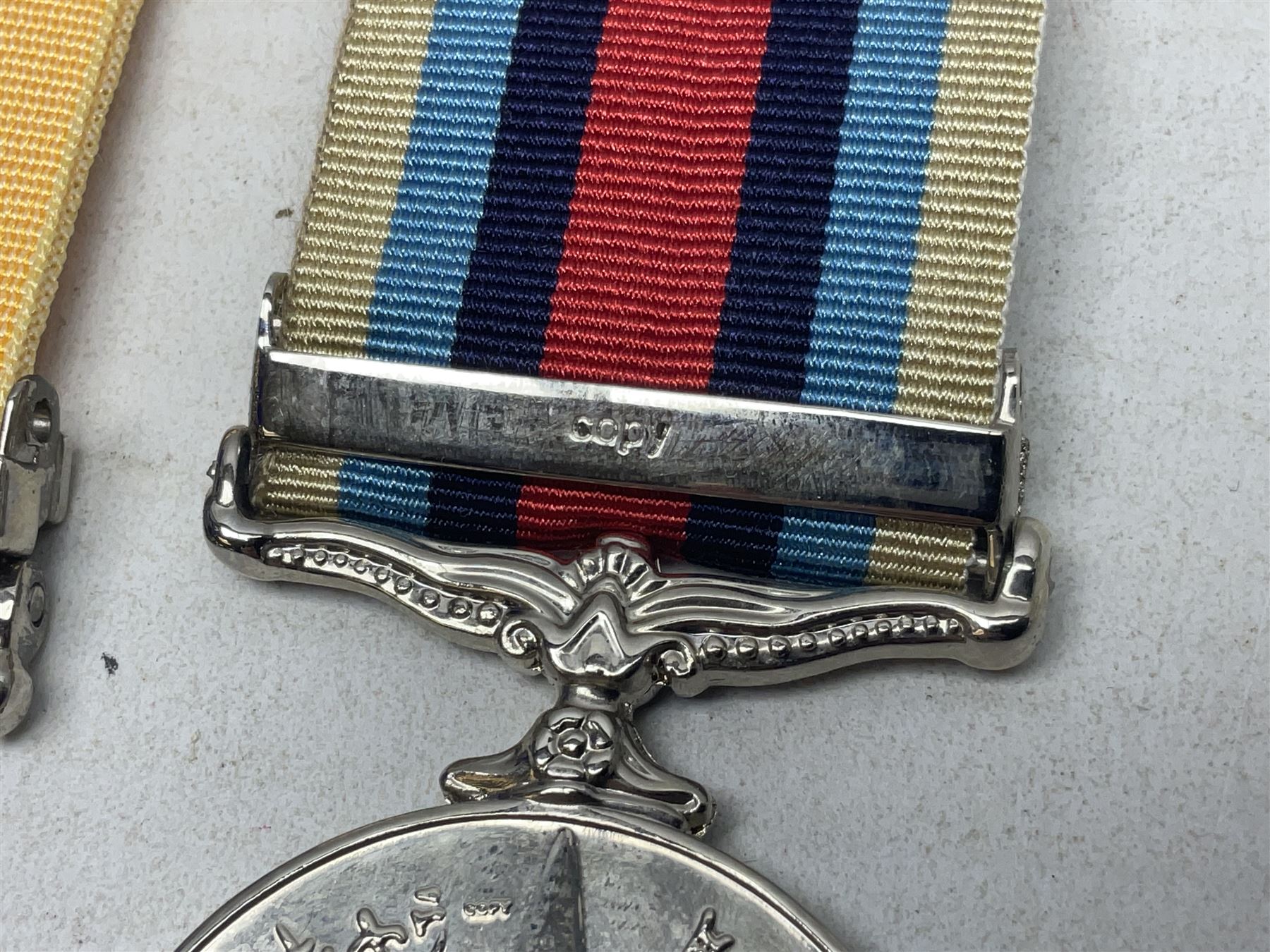 NATO Service Medal with clasp for Former Yugoslavia; together with three copy medals - Iraq Medal with clasp for 19 Mar to 28 Apr 2003 and unfitted rosette; Operational Service Medal with Afghanistan clasp; and QEII Golden Jubilee 2002 medal; all with ribbons (4)
