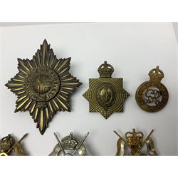 Nine Lancers metal cap badges including 9th, 12th Royals, 24th, 16th Queens and 17th; together with eight various Guards/Dragoons badges (17)