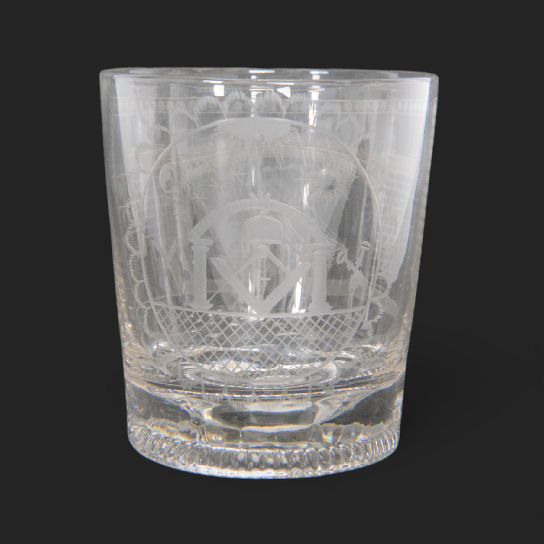 Unusual 19th century Sunderland Bridge and Masonic glass tumbler, circa 1800-1830, of slightly tapering cylindrical form, engraved with a masted frigate sailing beneath the Sunderland Bridge, and circular panel containing Masonic symbols including sextant, keys, and sun, moon and stars verso, with moulded concentric ring beneath, H9cm