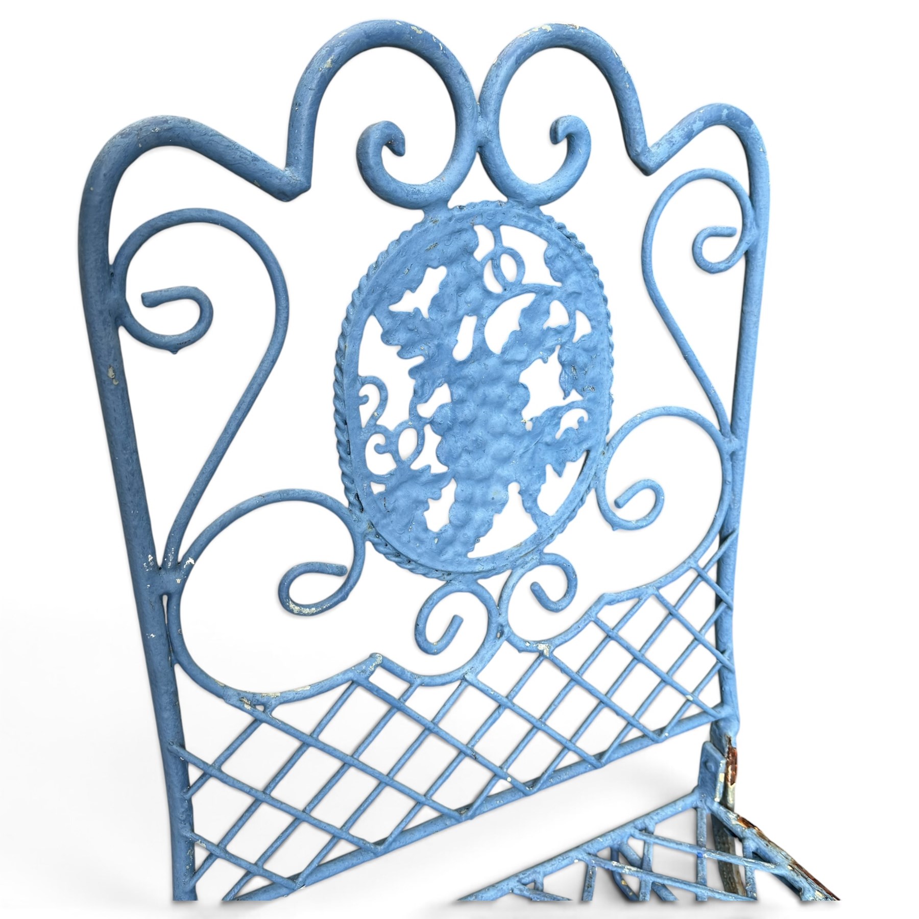 Three-piece French style blue-painted wrought iron garden bistro set, comprising a circular folding table with latticework top and central fruiting grapevine medallion (W71cm H76cm) and matching pair of chairs, with scrolling cresting rail and grapevine motif over folding X-frame base (W40cm H98cm)