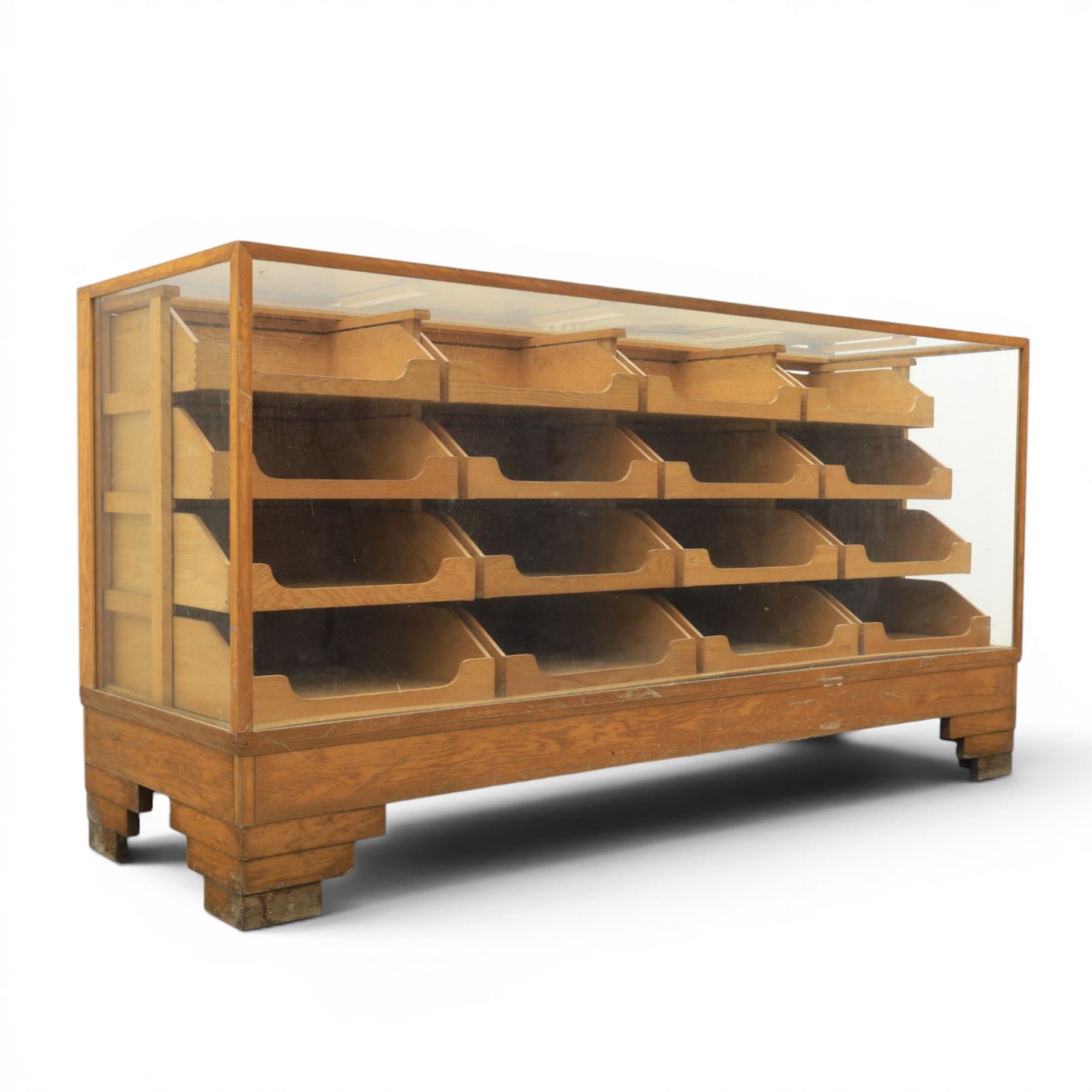 Dudley & Co - early 20th century oak framed and glazed haberdashery shop counter, fitted with sliding tray drawers