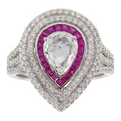 18ct white gold diamond and ruby pear shaped cluster ring, central rose cut pear shaped diamond of approx 0.50 carat, with calibre cut ruby surround and two rows of round brilliant cut diamonds, with diamond set shoulders, stamped 750, total diamond weight approx 1.05 carat 