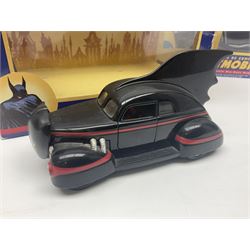 Five Corgi Batmobile die-cast vehicles from the DC Comics collection, to include 1940’s DC Comics BMBV2 1:18 and BMBV1 1:24 scale Batmobiles, all in original boxes 