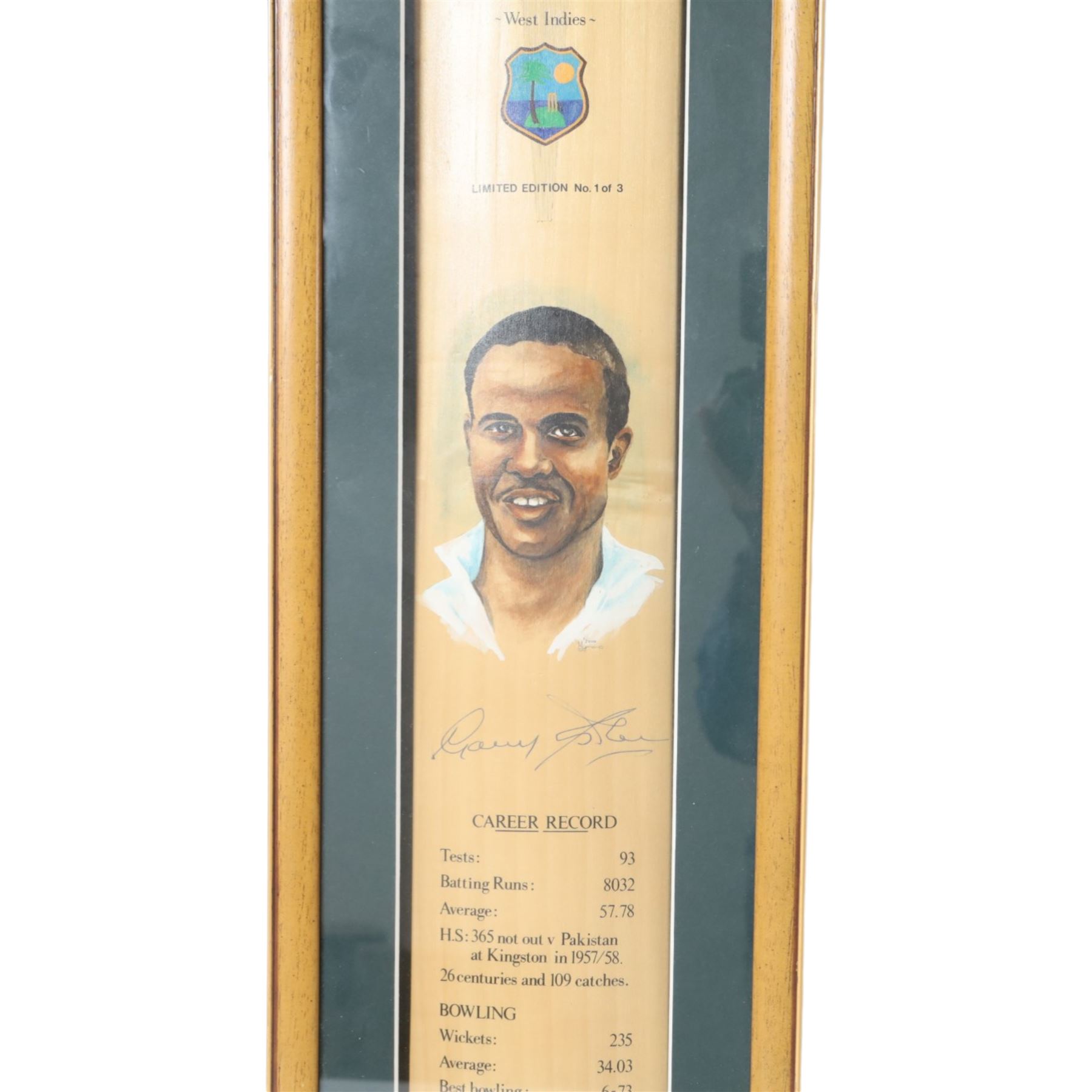 Limited edition signed Sir Garfield Sobers Career Record cricket bat limited edition no. 1of 3, in glazed display case, together with a Sir Garfield Sobers career record montage, with signed miniature bat and four black and white photographs, framed, tallest H97cm