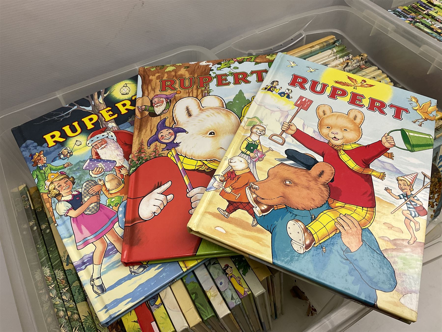 Sixty-eight Rupert Bear Annuals; almost complete run 1954 - 2016, lacking 1960/73/74; some duplicates/triplicates; together with a Wedgwood Rupert Bear Collector's plate (69)