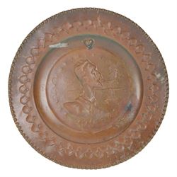 Two Spanish copper  charger decorated with Don Quixote, together with another copper dish  