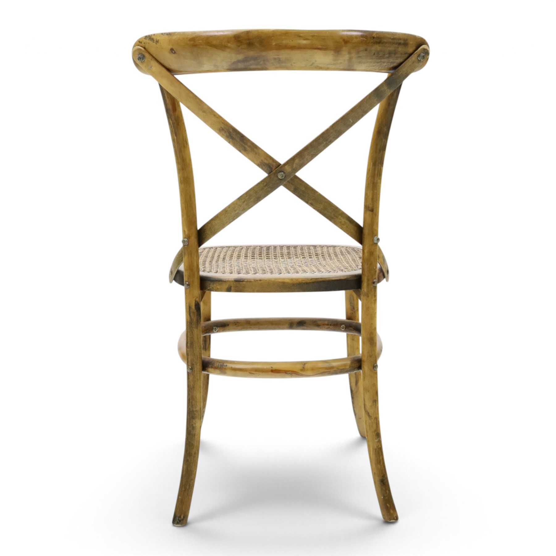 Set of four Oka style rattan dining chairs, bentwood frames inset rattan seat