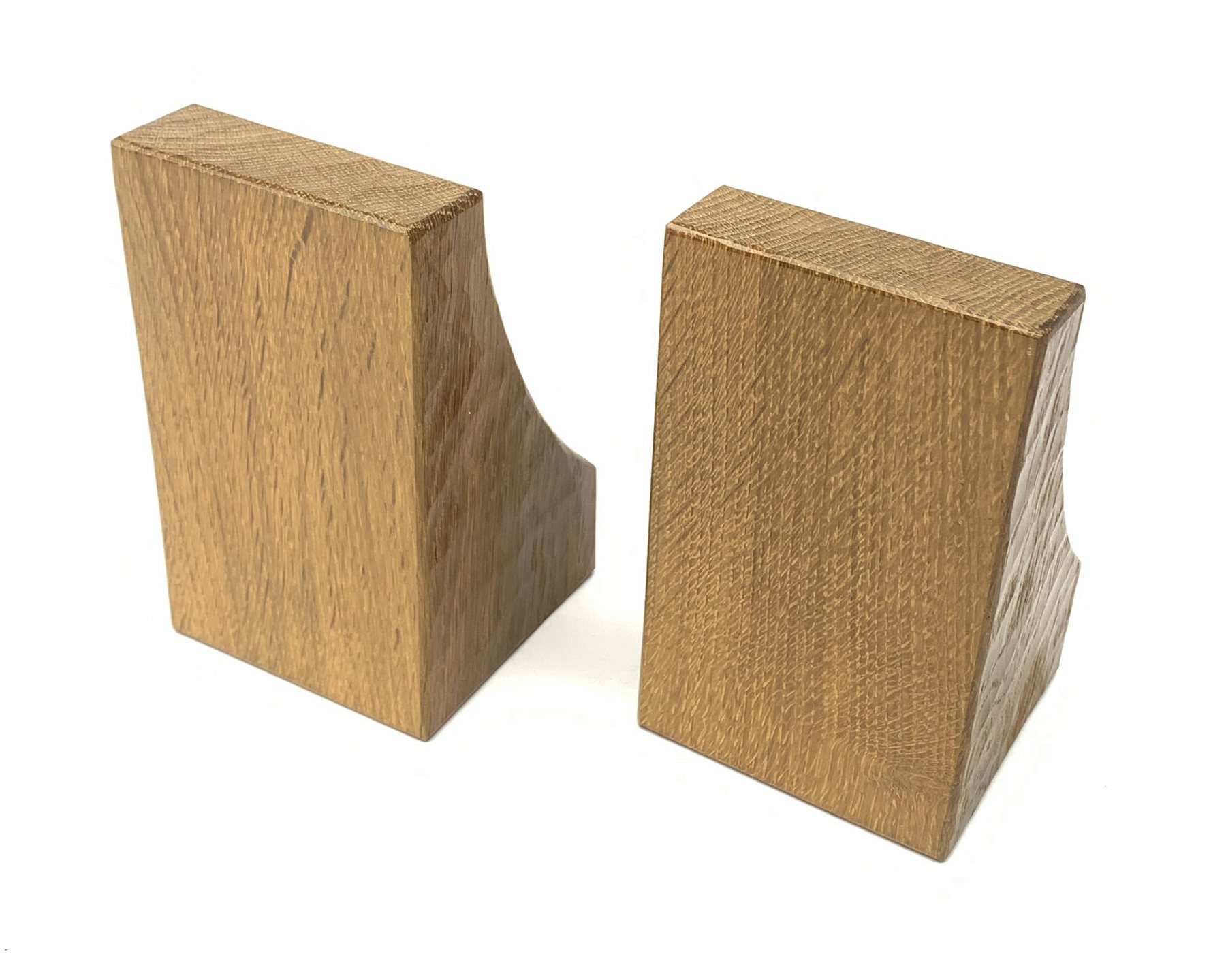 'Mouseman' pair adzed oak bookends by Robert Thompson of Kilburn, carved mouse signature to each end, H16cm