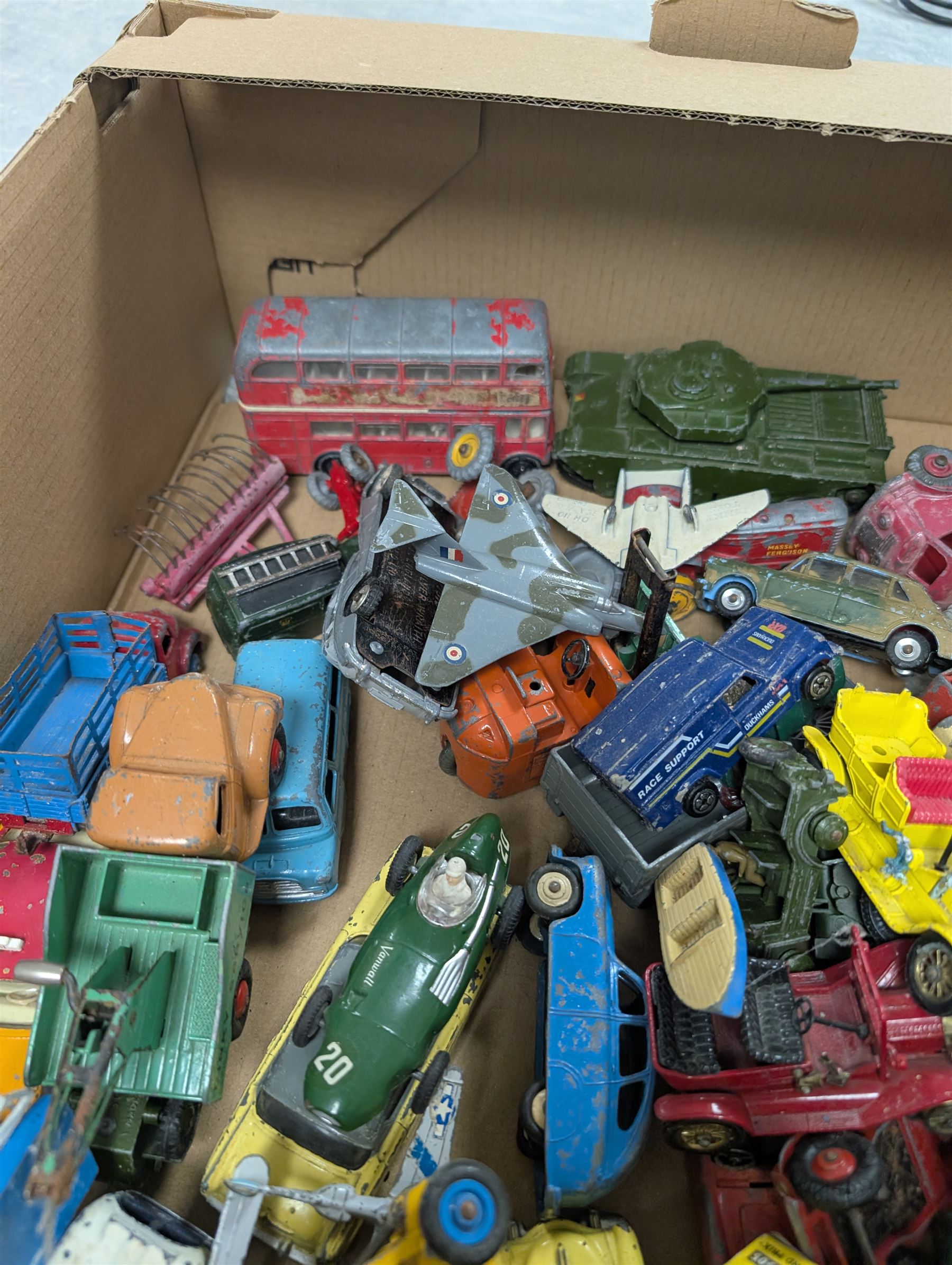 Collection of diecast model vehicles, including Dinky and Corgi examples, mostly loose and playworn