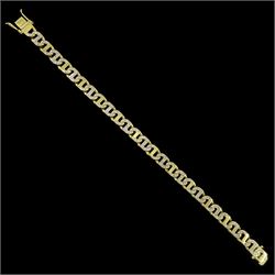 18ct gold diamond set marina link bracelet, stamped 750