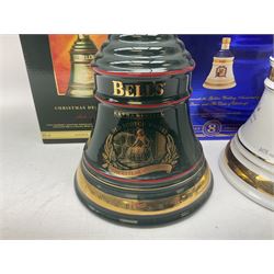 Bells, 8 year old, Scotch whisky, in Seven Wade ceramic decanters, comprising christmas decanters 1994, 1995, 1996, 1997 and 1998, Golden Wedding anniversary of the queen and the duke of Edinburgh decanter and the prince of wales 50th birthday decanter, all 70cl, 40% vol, all in original boxes