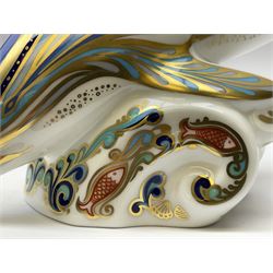 Four Royal Crown Derby paperweights, Llama, with gold stopper, Snake, with gold stopper, Honeybear, with silver stopper and Striped Dolphin, with gold stopper and box, all with printed mark beneath 