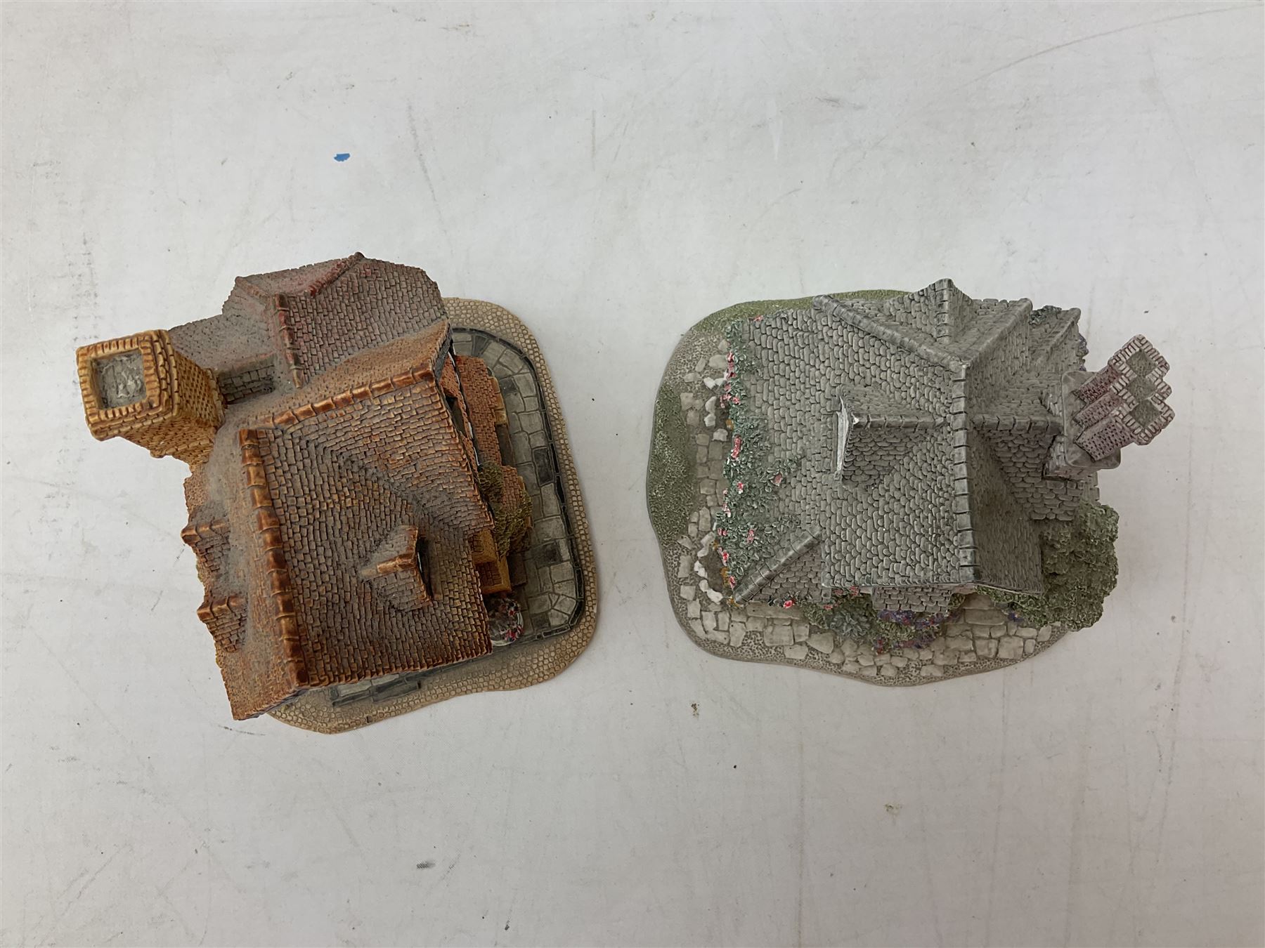 Eleven Lilliput Lane models, to include St Marks, Rose Cottage, Puffin Row, Village School, Swan Inn etc, all boxed