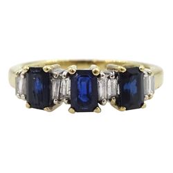 9ct gold three stone emerald cut sapphire ring, with baguette diamonds set between, hallmarked, total diamond weight 0.25 carat