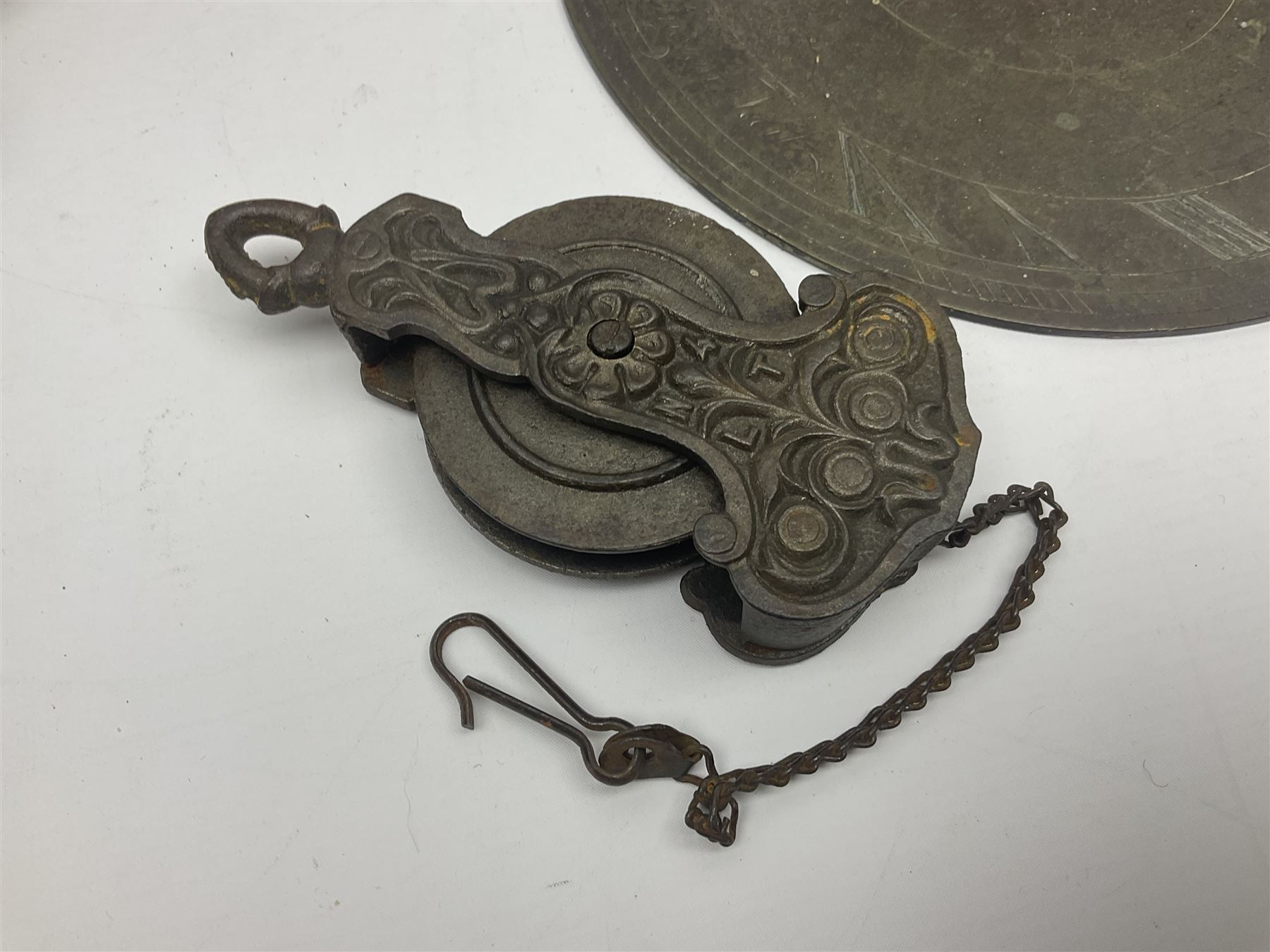 Two 19th century copper tankards, one with weighted wooden base, together with copper and wooden mechanical bellows, sundial and other metalware 