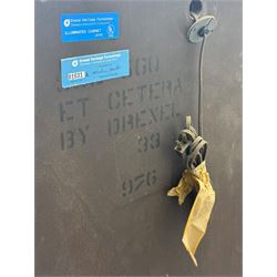 Chinese brown lacquered cocktail cabinet, decorated with gilt scenes of a traditional landscape with figures, pagodas, and mountainous scenery, double doors opening to reveal fitted interior with mirrored back, wine rack, shelves and cupboard, raised on square supports