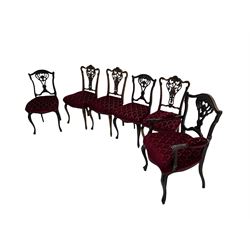 Late 19th century matched walnut salon suite - shaped cresting rails over pierced and carved splats, all upholstered in foliage patterned fabric, cabriole supports, five side chairs and one elbow chair