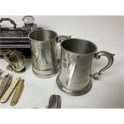 Victorian ebonised wooden desk stand, with brass mounts and two glass inkwells, together with two pewter tankards with Masonic engravings, two pewter quaiches, horn handled carving set, the fork with silver mounts and a collection of other metalware