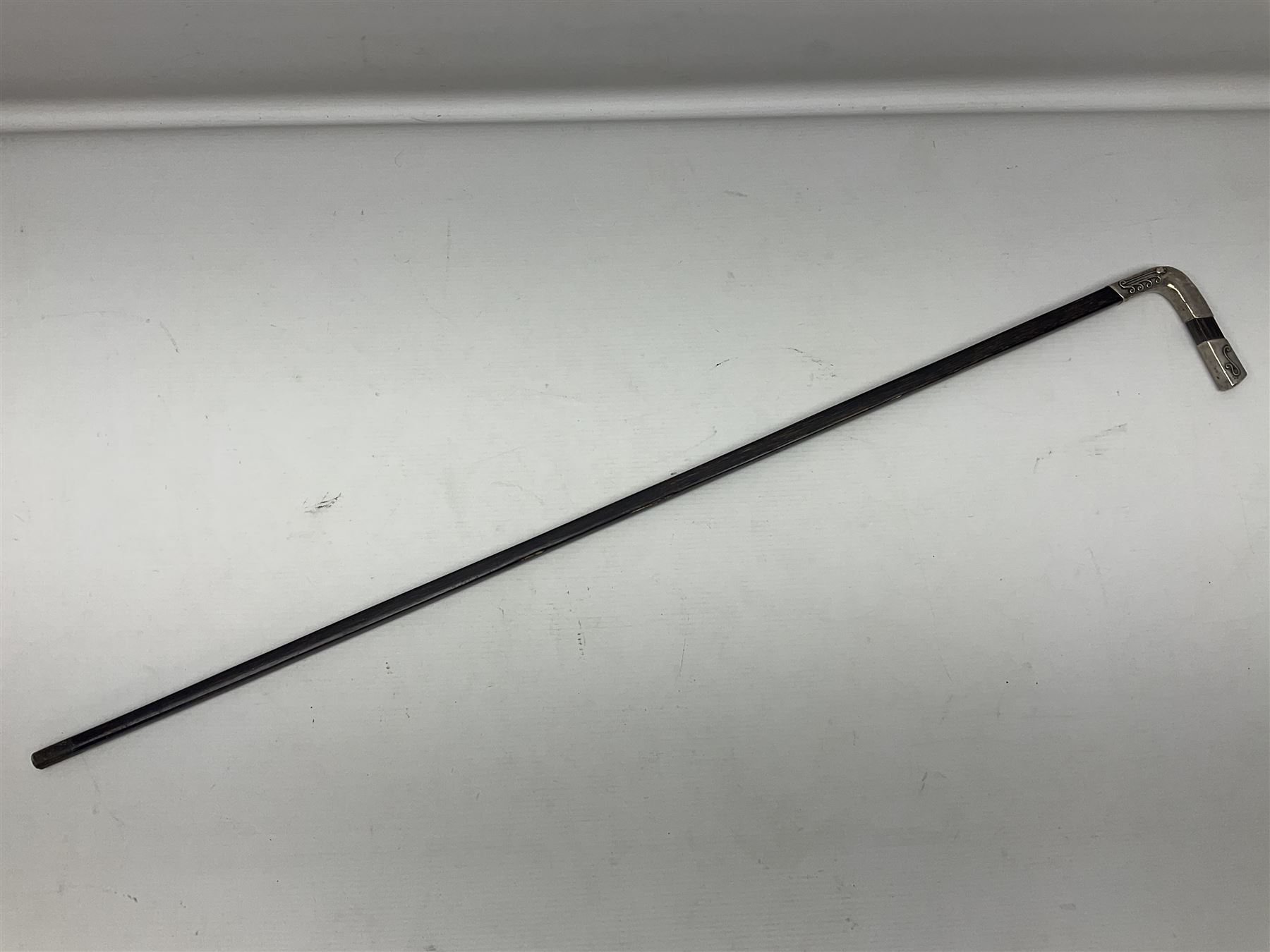 Austrian Art Nouveau zebra wood walking stick, silver covered angular handle relief decorated with stylised flowers, hallmarked Vienna c1900, makers mark LM, H84cm