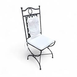 Wrought steel rectangular conservatory dining table, with glass top; and six, four side and two armchairs, with lattice backs and X framed bases, loose cushions