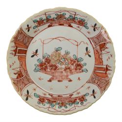 Amsterdam bont teapot, decorated with a basket of flowers, together with two Amsterdam bont saucers of similar design and five other saucers  