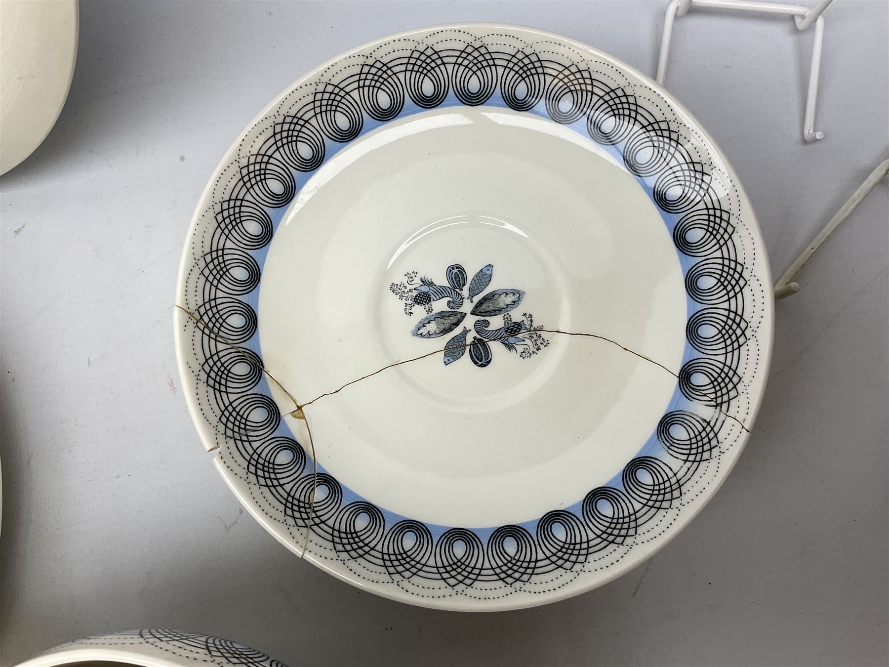 Wedgwood Persephone pattern part tea and dinner service, designed by Eric Ravilious, eight dinner plates, eight side plates, eight dessert plates, two covered tureens, meat platter, coffee pot, eight coffee cans and saucers, milk jug, covered sucrier etc (64)