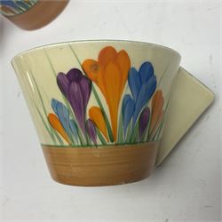 Clarice Cliff for Newport Pottery ceramics, comprising preserve jar and Bon Jour shape teacup, both in Crocus pattern, together with a Clarice Cliff for Wilkinson Ltd, preserve jar with cover, in Gayday pattern, preserve jar H10cm