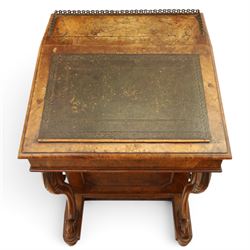 Victorian figured walnut Davenport, the fixed fall with drawer to the side enclosing writing compartment, green tooled leather writing inset, galleried back rail, right side fitted with four drawers behind a panel, opposing panelled side, raised on carved cabriole front supports with scroll terminals and platform base