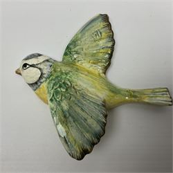 Beswick three flying blue tit wall plaques, all with impressed or printed marks verso 