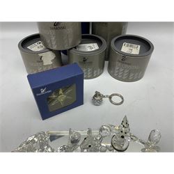 Collection of Swarovski Crsytal figures, to include Grizzly Bear Cub no.261925, Anteater, Kangaroo, Pig, other Swarovski keyrings etc and mirrored display stand