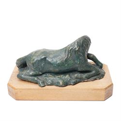 Mid-20th century painted terracotta figure of a recumbent horse, including wooden plinth W31cm