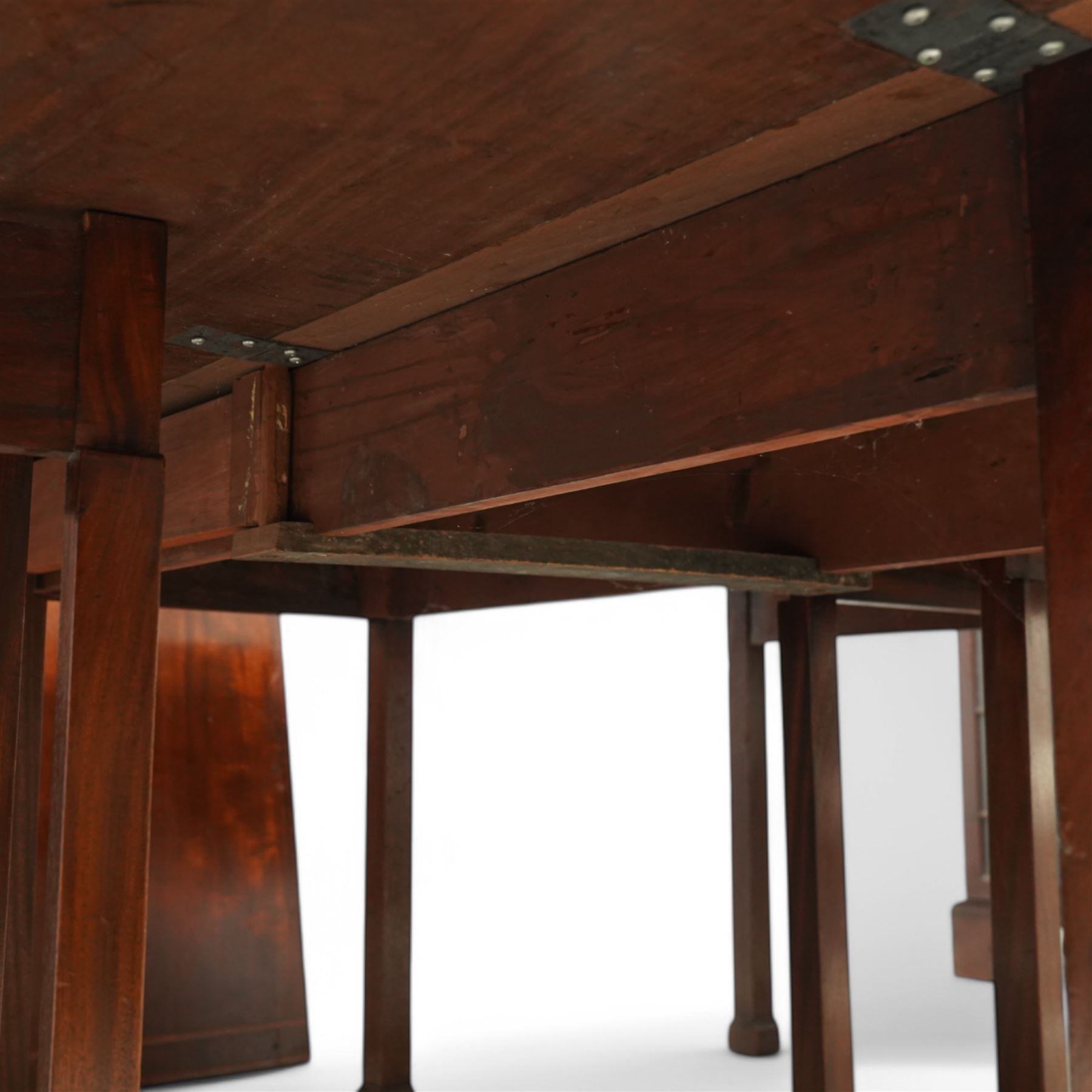 19th century and later mahogany extending dining table (12' 7’'), two D-ends, central drop-leaf table and two additional leaves, with satinwood bands, on square supports with block feet (lacking forks)
