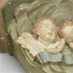 Set of three Belgian wall cornices, each with moulded shelf top above polychrome painted cherubic and rococo scroll ornament

Pale green (H 43cm, D 42cm, W 39cm)
Painted cherubs (H 51cm, D 47cm, W 49cm)
Darker green (H 46cm, D 42cm, W 50cm)