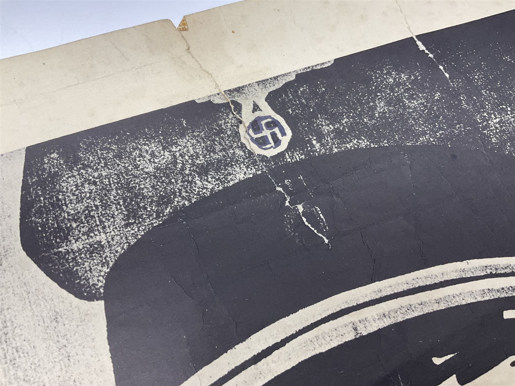 German monochrome 'Gestapo' poster, probably post-WW2, depicting the head of a grim faced Gestapo officer in uniform 55 x 42cm; unframed