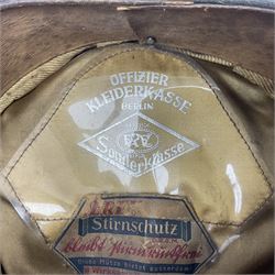 WW2 German Infantry Officer's visor cap with cloth insignia; labelled and stamped Offizier Kleiderkasse Berlin and Erel Stirnschutz