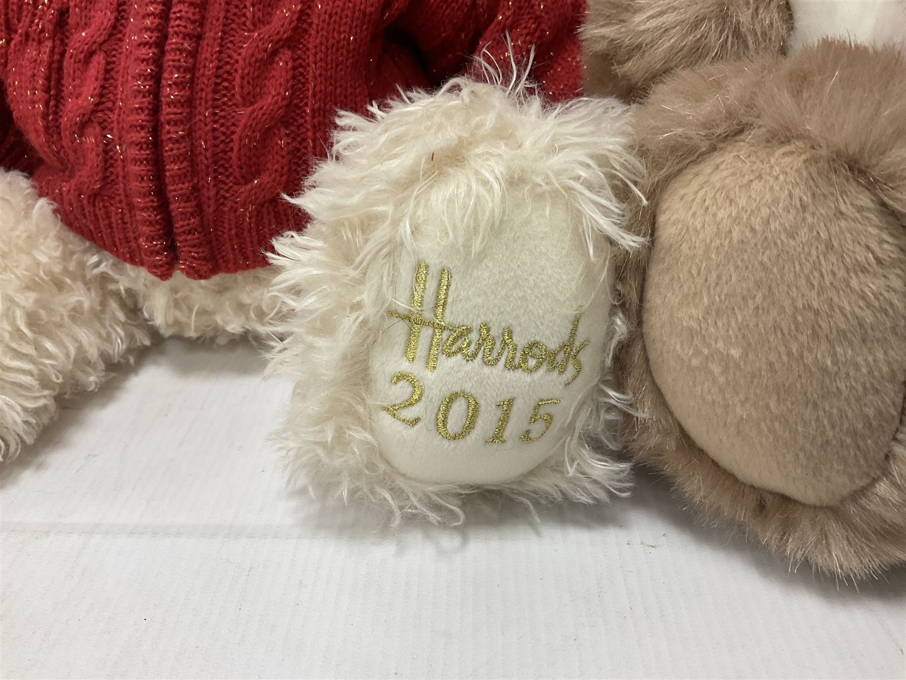 Six Harrods annual teddy bears, dating between 2011 and 2016, tallest H38cm