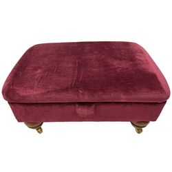 Duresta - traditional shape armchair upholstered in burgundy red velvet, on square tapering front supports (W88cm, H85cm, D103cm); together with a matching rectangular footstool with hinged seat, on turned feet with brass castors (73cm x 54cm, H38cm)