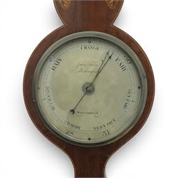 John Fiora- Nottingham, George III mahogany and inlaid wheel barometer, with a circular silvered brass dial, and spirit thermometer, shaped case with swan neck pediment surmounted by a brass finial, shell and floral paterae inlay, and boxwood stringing, U-shaped glass tube damaged/incomplete 