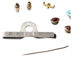 Pair of silver and enamel J clip on earrings, pair of gold cabochon garnet dress studs, silver money clip, gold dress stud and three backs, diamond set stick pin head etc 