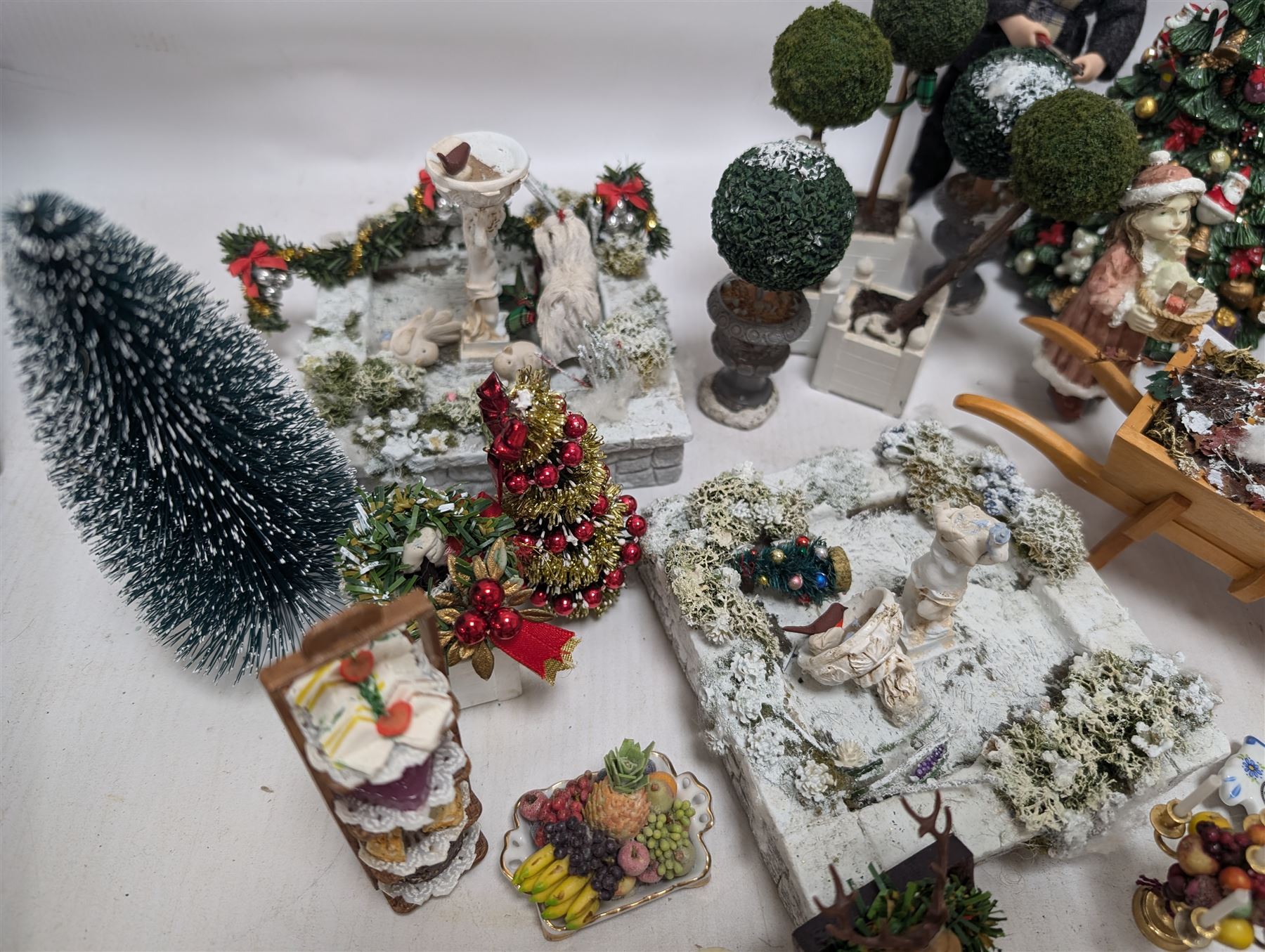 Dolls house conservatory and garden accessories, including sofa and chairs, trees, plants, paintings, Christmas decorations, etc 