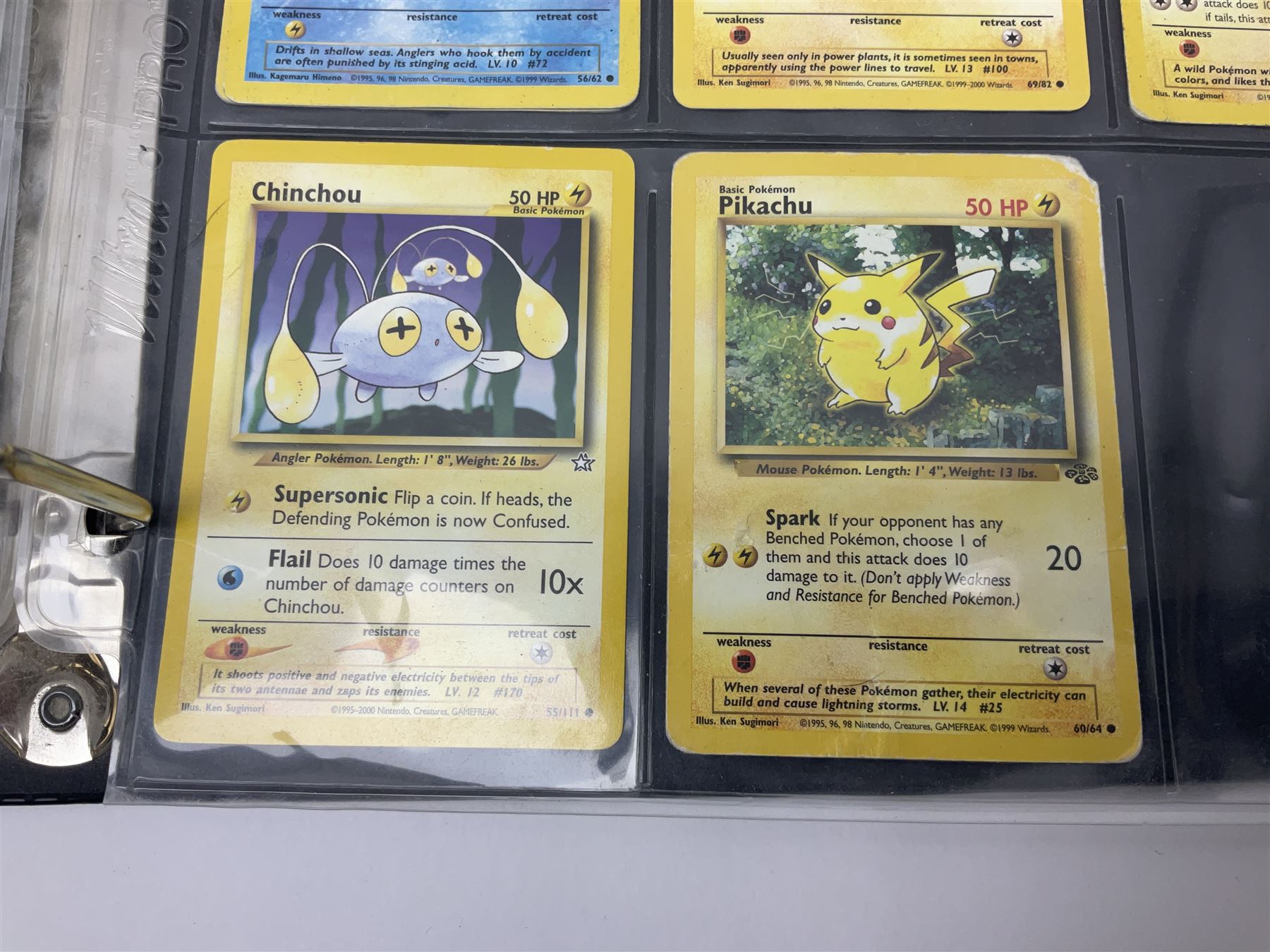 Collection of Pokemon trading cards, mostly 1999 Wizards Pokemon cards to include holo Charizard 4/102, first edition holo Machamp 8/102, further holographic cards; Dark Flareon 35/82 and Dark Vaporeon 45/82, cards from themed sets and 4th edition prints; 1998 Electronic Pokédex with cardboard boxes for themed decks Blackout, Overgrowth and Power Reserve Jungle, along with a large quantity of energy and trainer cards 