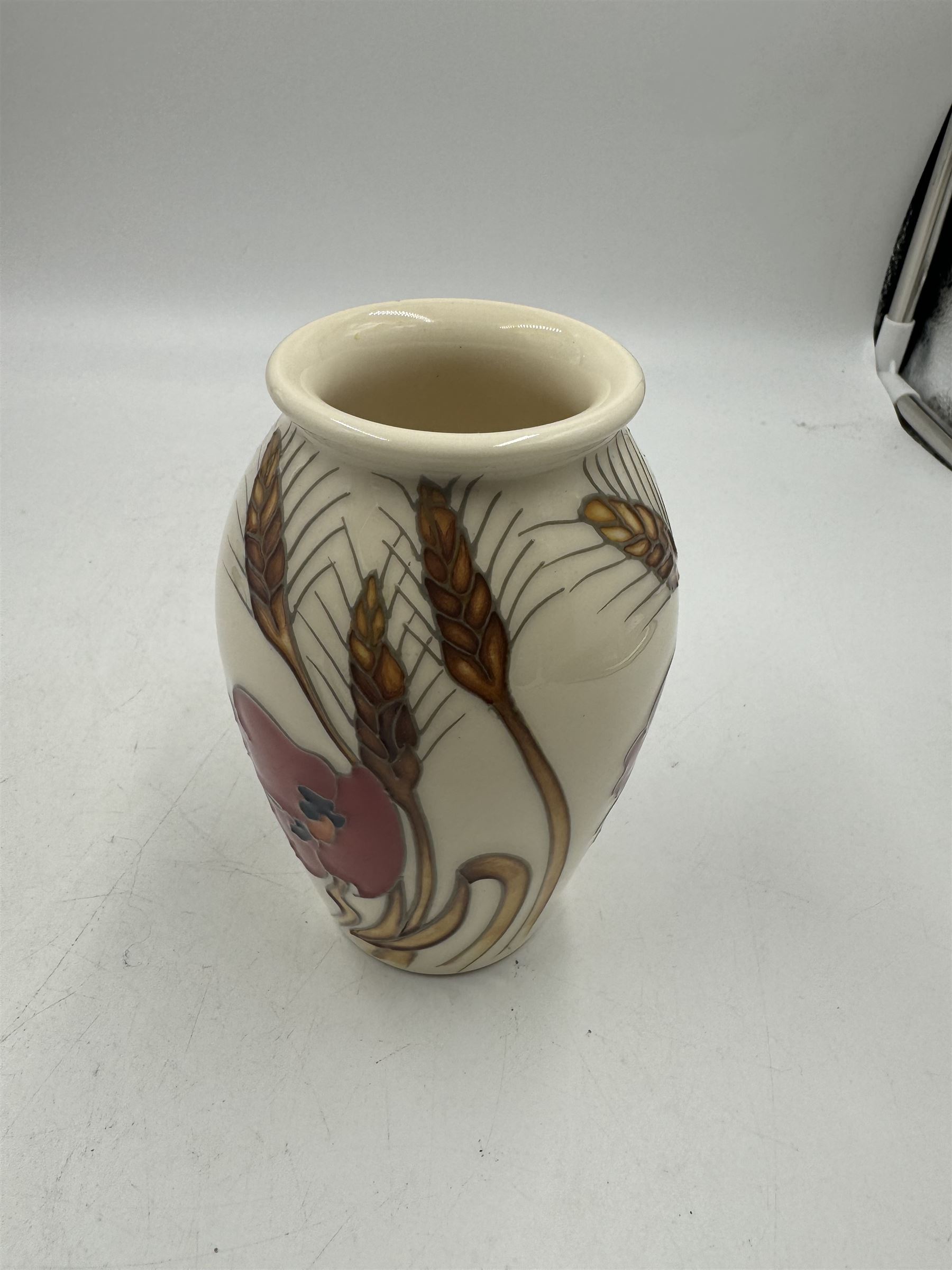 Moorcroft vase, decorated in Harvest Poppy pattern on white ground, H14cm