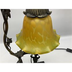 Art Nouveau style lamp in the form of a woman on a swing, with a green mottled shade, upon a marble base H52cm