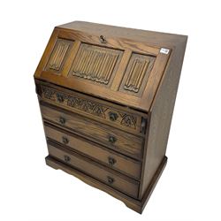Old Charm oak bureau, fitted with fall front above four drawers