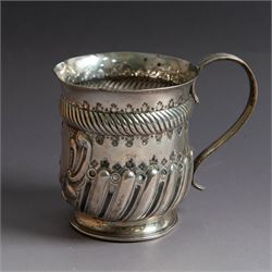 Victorian silver christening mug, of circular form with C scroll handle, embossed with scr...