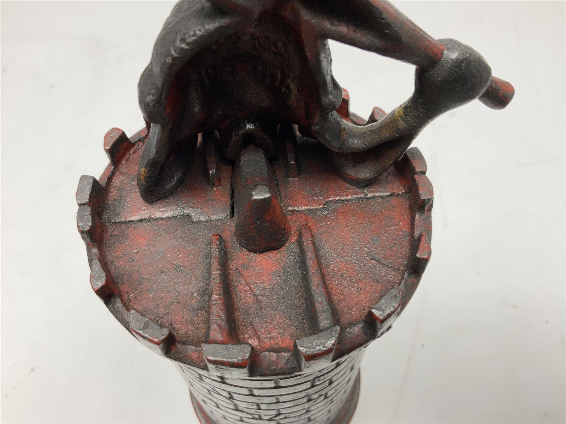 Late 19th century cast-iron mechanical money bank 'Giant in Tower' by John Harper & Co; reg.no.196844, patented 13th August 1892 H23cm