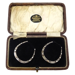 Pair of silver horseshoe napkin rings by William Base & Sons, Birmingham 1928, 
 retailed by Jamieson & Carry, Aberdeen, cased