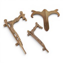 Collection of brass watch stands, including an example modelled as a cherub upon an onyx base, tallest H17cm  