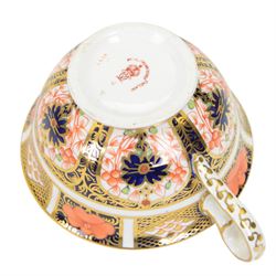 Royal Crown Derby tea service for six in Imari 1128 pattern, comprising teacups and saucers, side plates, sandwich plate, milk jug, open sucrier and cake slice 